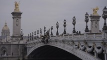 Paris, France - Pont Alexandre III a deck arch bridge with Art Nouveau Lamps that spans the Seine River