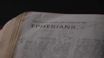 Light revealing a Bible and the book of Ephesians