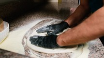 Pizza Chef Making The Gluten Free Dough On The Marble Of Italian Pizzeria