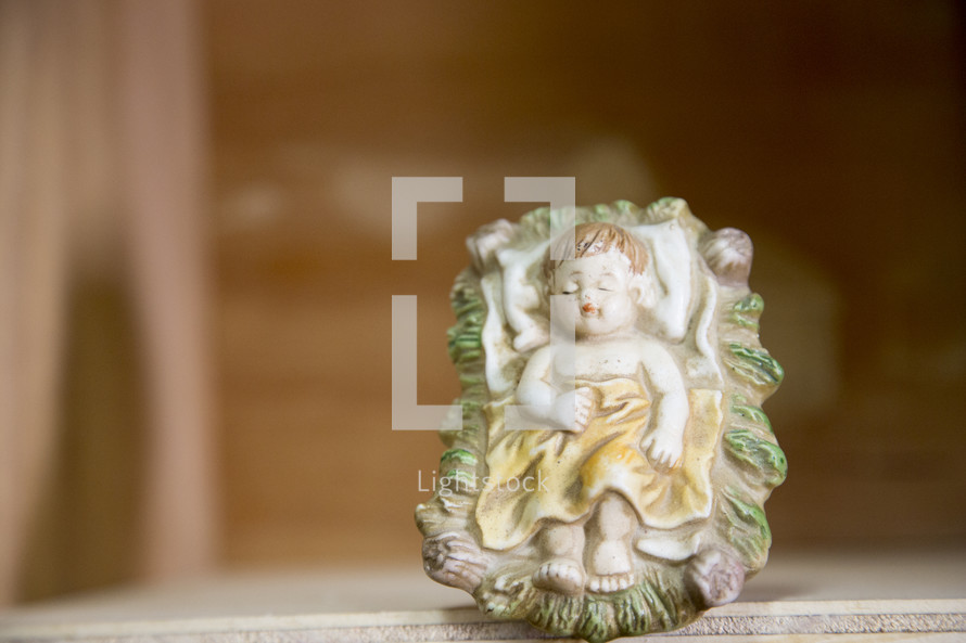 Porcelain figure of baby Jesus