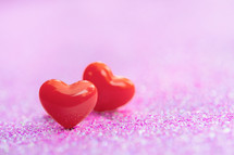 red hearts on a purple background 