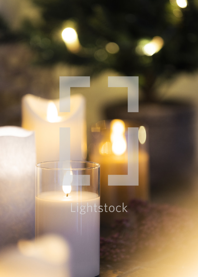 "Christmas Candle Closeup: Embodying the Holiday Spirit in Every Glow