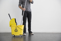 man with a mop 