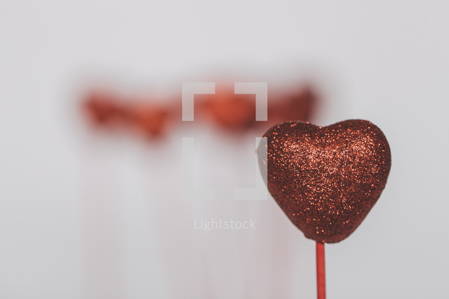 glittery heart on a stick 
