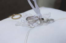 wedding rings on a ring bearer pillow 