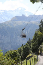 chair lift up the side of a mountain in summer 