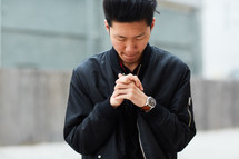 praying young man
