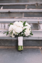 bridal bouquet on steps 