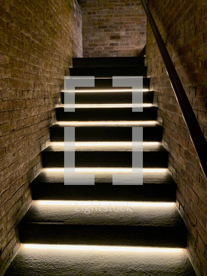 lights on stairs in a stairwell 
