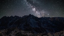 Magical time-lapse of milky way galaxy stars in alps mountains
