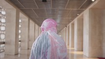 Woman Female Model with Hijab Walking Inside Mosque