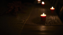 Lit candles on a table