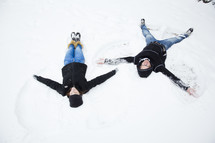 making snow angels in the snow 