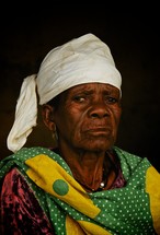 elderly woman with a scarf on her head in Rwanda 