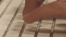 person typing on a keyboard 