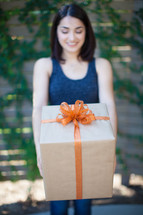 a woman receiving a gift