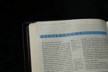 Open Bible in the book of Deuteronomy
