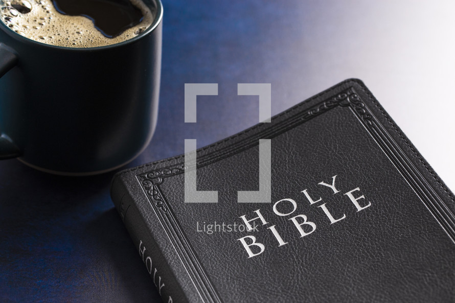 Holy Bible and coffee mug 