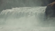 rushing water at a waterfall 