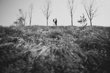 Bride and Groom in a field
