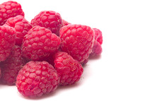 raspberries on white background 