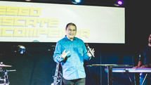 pastor holding a microphone 