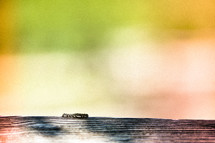 caterpillar crawling on wood fence 