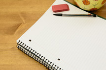 pencil, notebook, and eraser
