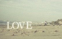 a couple on a beach and the word LOVE