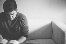 A man reading a Bible