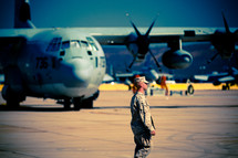 A Serviceman walks the flight line at the Miramar military base.  