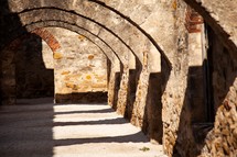 stone archways in the ruins of one of the San Antonio missions