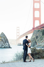 Couple by Golden Gate Bridge