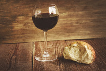 wine glass and loaf of bread 