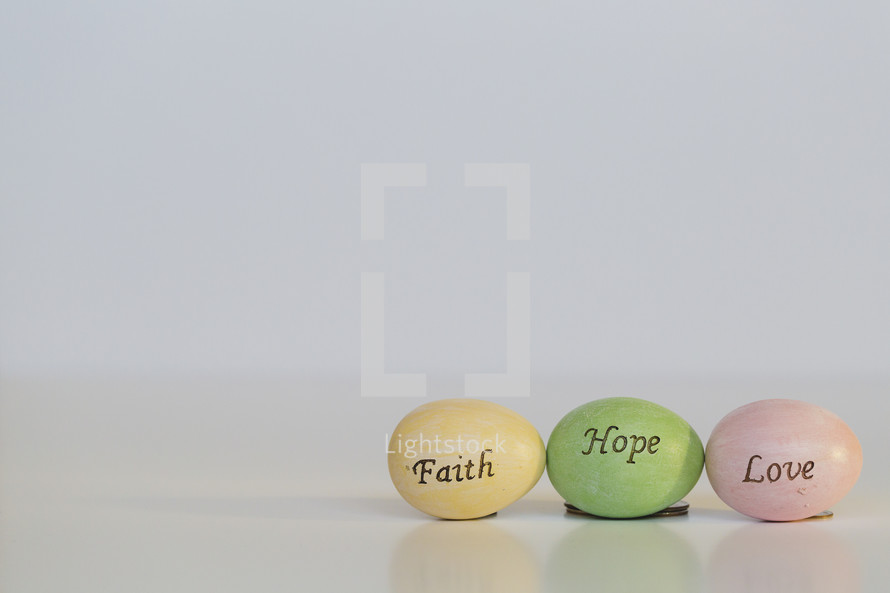 Faith, Hope, Love on Easter eggs 