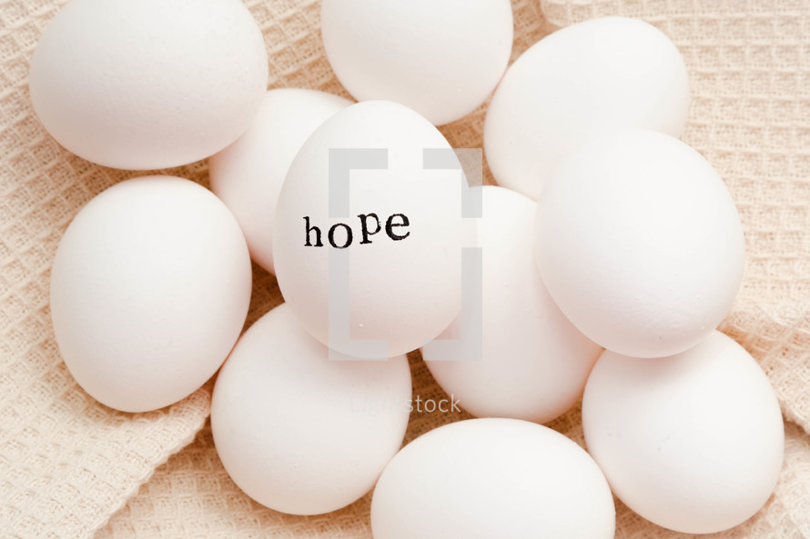 word hope on white eggs 