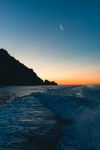 Motorboat wake at sunset light