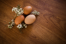 brown eggs and flowers 