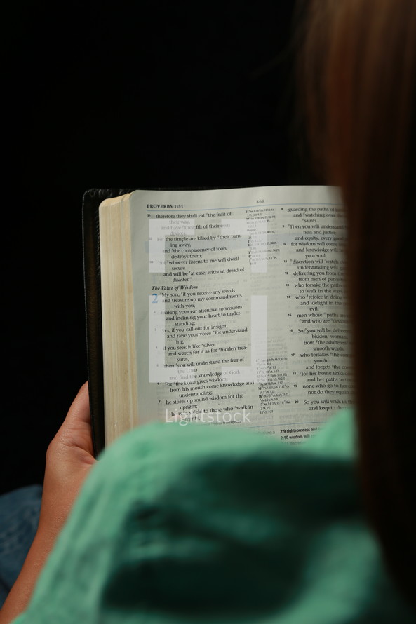 Woman reading Bible