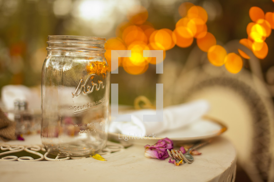 empty mason jar sitting on a table