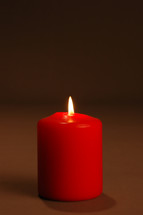 flame on a red candle 
