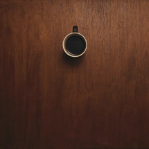 looking down at a coffee mug
