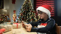 Kid playing with his gift for Christmas 