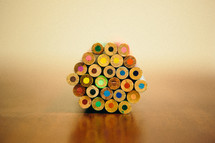 bundle of unsharpened colored pencils 