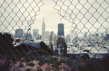San Francisco through a broken fence 