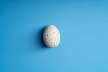 Easter egg on a blue background 