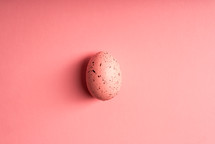 pink Easter egg on a pink background 