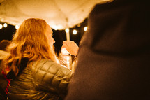 Candle light service in a tent