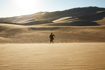 a man running in the sand 