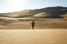 a man running in a desert 